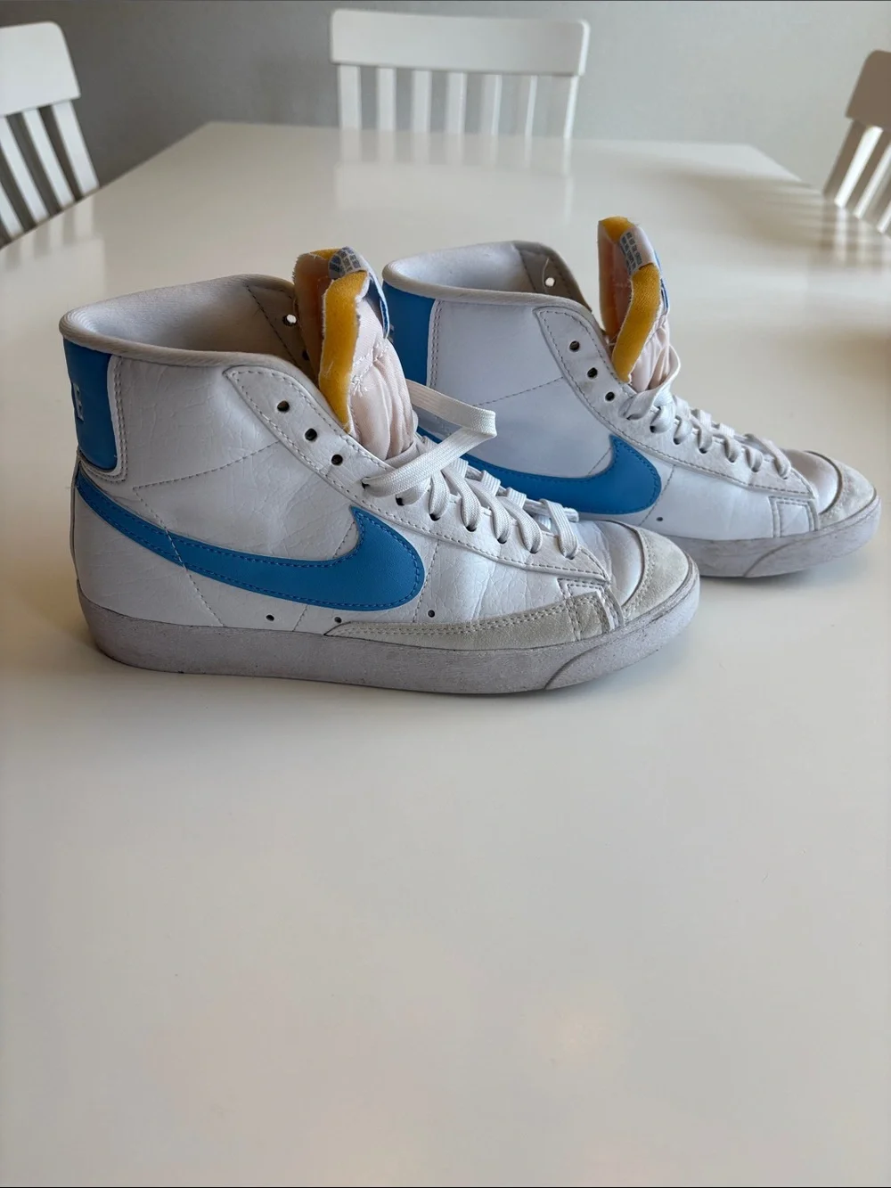 Nike Blazers Women’s High-Top Sneakers in White and Light Blue Swoosh